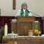 Pastor Jean in the Pulpit